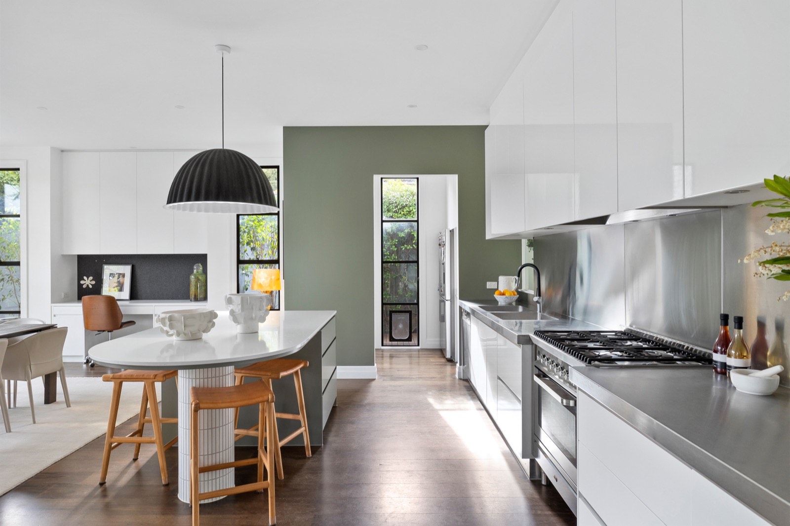 Kitchen with green island